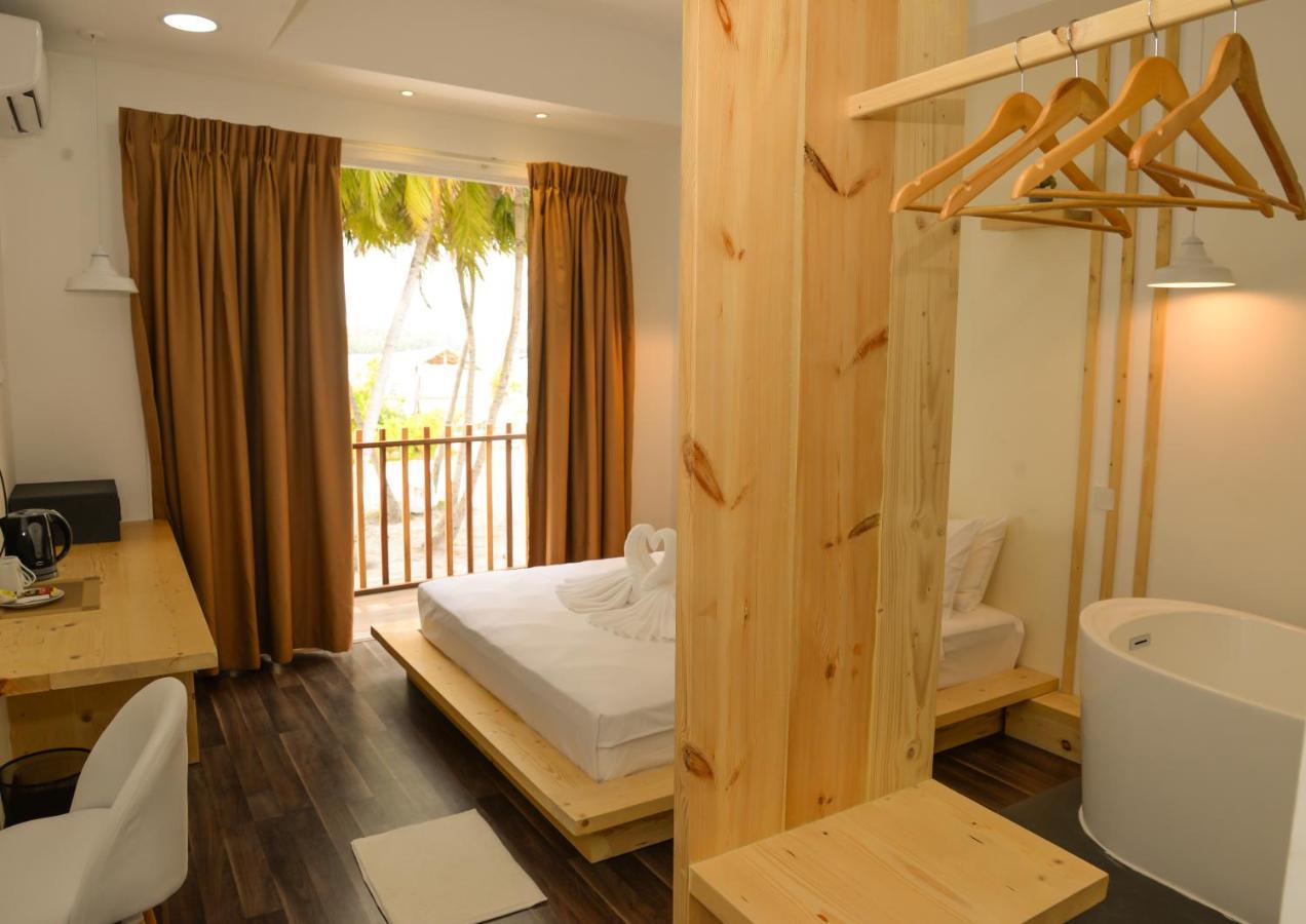 Portia Hotel & Spa Dhiffushi Exteriör bild