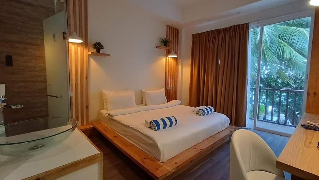 Portia Hotel & Spa Dhiffushi Exteriör bild